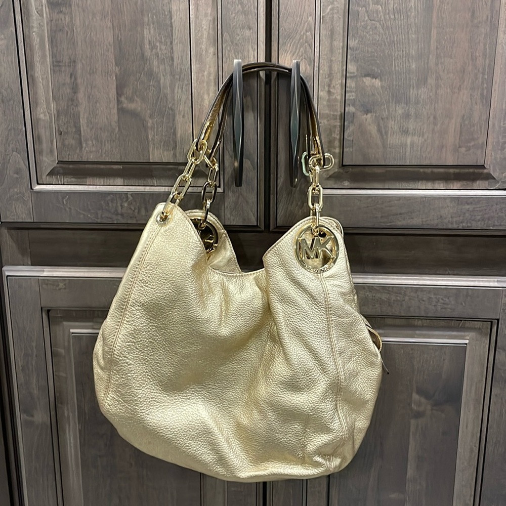 Michael Kors hobo gold handbag